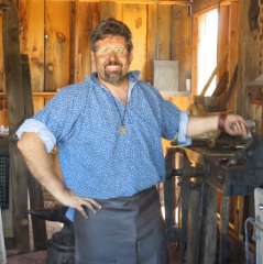 Michael at the anvil in the original Dragonforge shop.